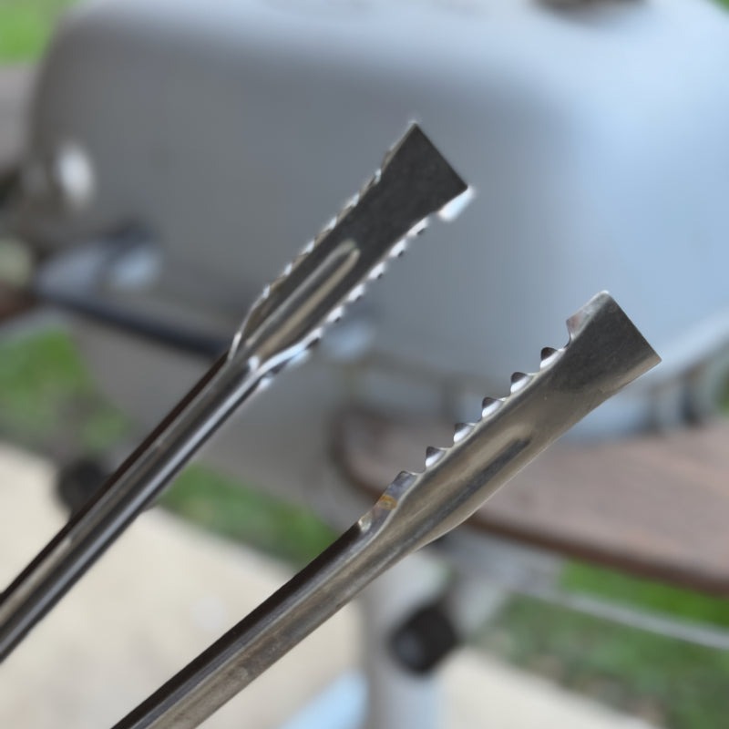 Precision-grip ergonomic grilling tongs